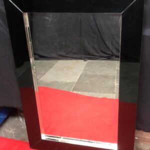 Vertical mirror with black glass border
